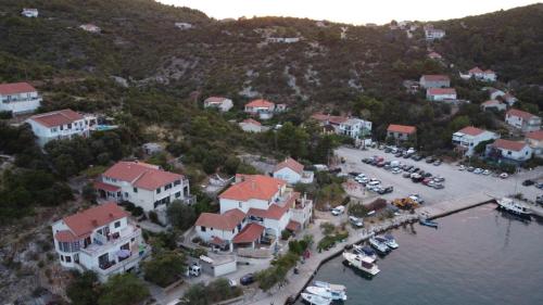 an aerial view of a town with a marina at Apartment ZAGLAV 1 in Zaglav