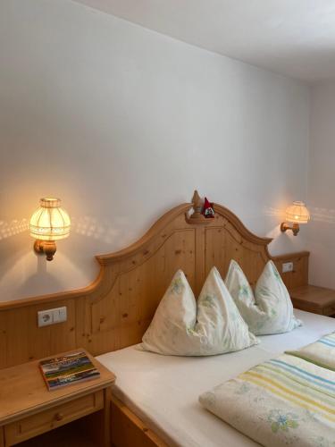 Säng eller sängar i ett rum på Planitzhof