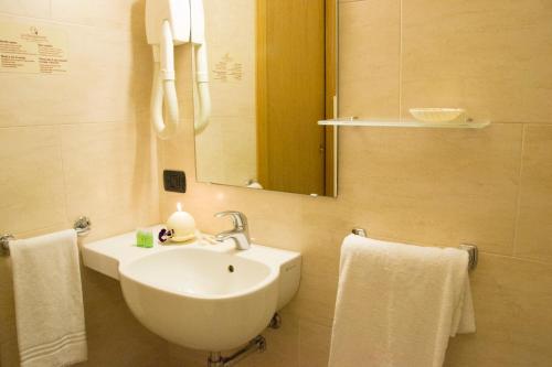 Koupelna v ubytování Lo Scoiattolo Piedmont Bike Hotel
