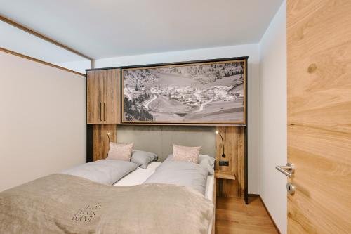 A bed or beds in a room at 1400 FlexenLodge