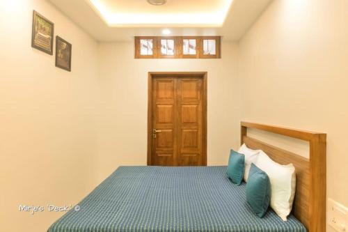 เตียงในห้องที่ Mirje's Deck - Homestay - Family Rooms