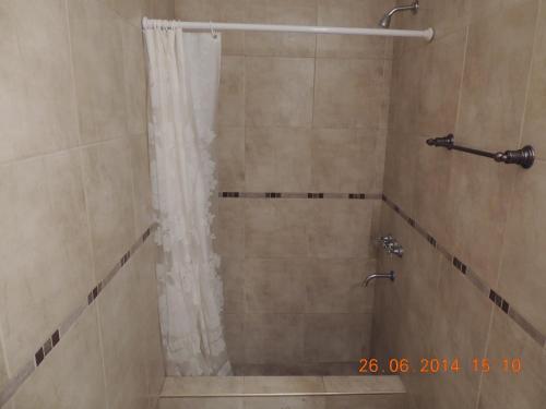 Ванная комната в Departamentos Urquiza