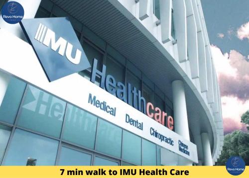a sign on the side of a hospital building at Revo Home at Pavilion Bukit Jalil in Kuala Lumpur