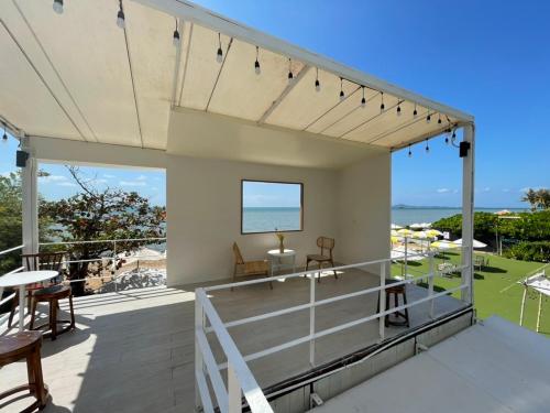 a balcony with a view of the ocean at Residence By Hello Pattaya At Veranda in Jomtien Beach
