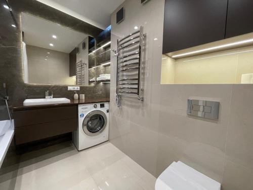 Ванная комната в Apartments VIP AVALON