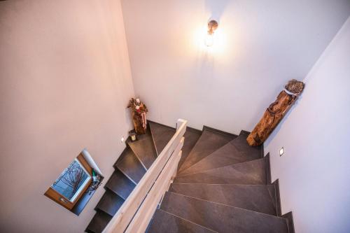 a view of a staircase in a house at Brugghof Apartement Lärche in San Felice