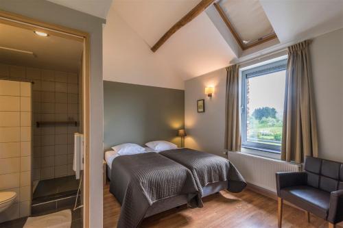 Postel nebo postele na pokoji v ubytování Maison Berton