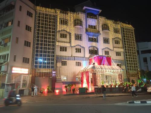 a large building with christmas lights on it at Chandra Inn in Jodhpur