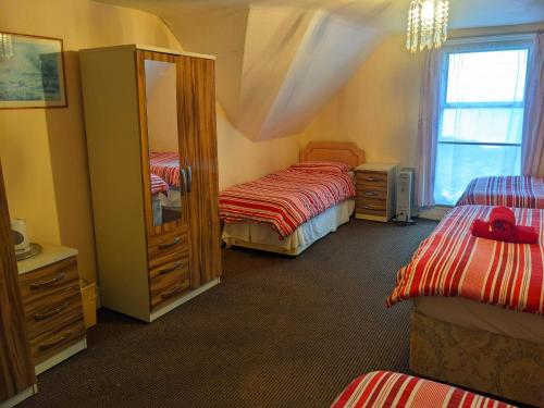 Ένα ή περισσότερα κρεβάτια σε δωμάτιο στο Altavia Hotel