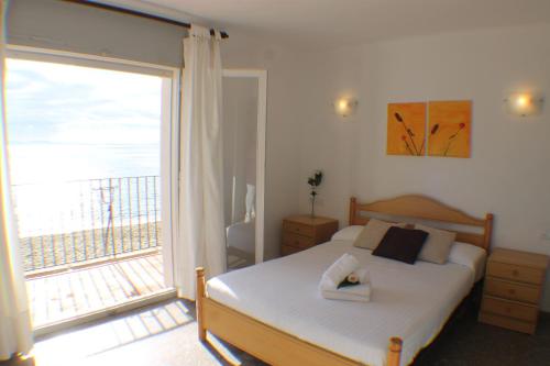 Ένα ή περισσότερα κρεβάτια σε δωμάτιο στο Agi Gaviota Villa