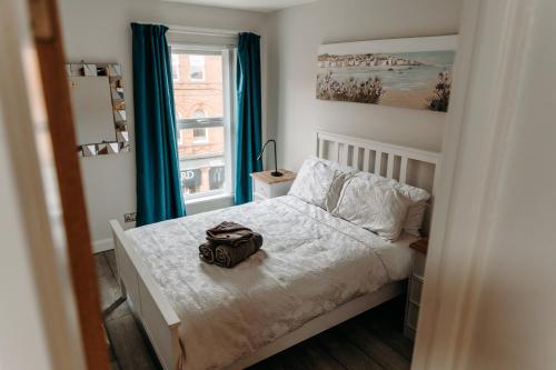 Un pat sau paturi într-o cameră la Mountain View Apartments