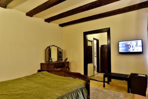 Säng eller sängar i ett rum på Casa Antiqua