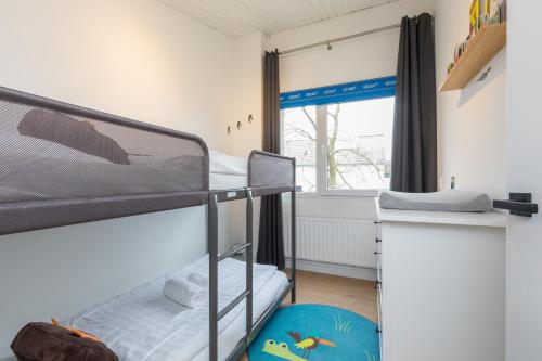 Postel nebo postele na pokoji v ubytování Welcome in - Lepelblad 7, Nieuwvliet