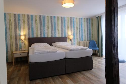 Posteľ alebo postele v izbe v ubytovaní Zum Weissen Lamm