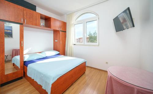 Posteľ alebo postele v izbe v ubytovaní Apartment and Room Stefanija