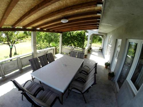 Posedenie v ubytovaní Holiday house in Ljubač with sea view, terrace, air conditioning, Wi-Fi (4851-1)