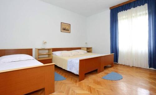 Posteľ alebo postele v izbe v ubytovaní Holiday house in Ljubač with sea view, terrace, air conditioning, Wi-Fi (4851-1)