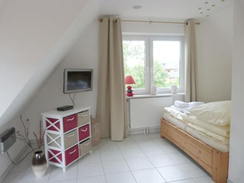 Postel nebo postele na pokoji v ubytování Appartement Sandröschen