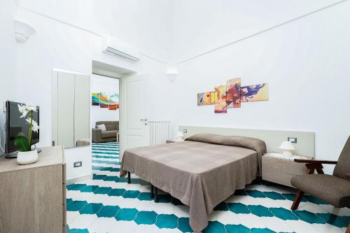 Posteľ alebo postele v izbe v ubytovaní Casa Don Plinio Amalfi Center