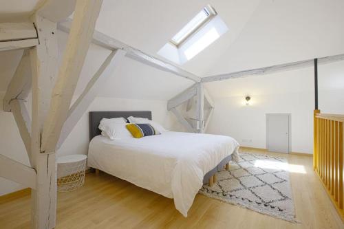 Cama o camas de una habitación en Appartement Gambetta