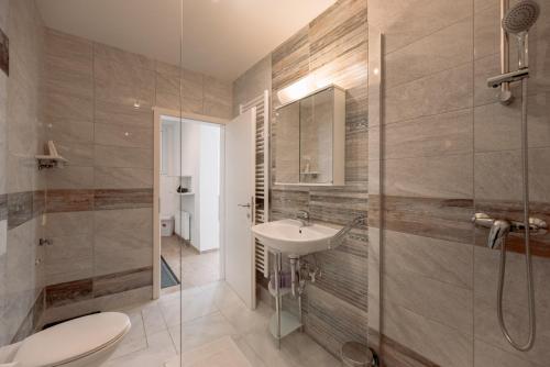 Ванна кімната в Apartments Gozd Martuljek