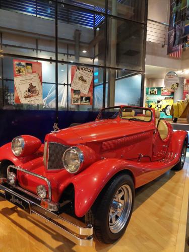 a red car is on display in a museum at E&A Homestay KLIA/ Sepang/ Nilai in Sepang
