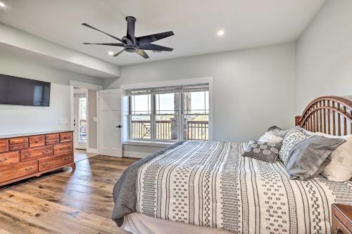 a bedroom with a bed and a ceiling fan at Laurel Fork Condo on Olde Mill Golf Course! in Ararat