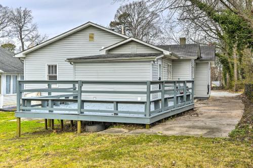 a house with a blue porch in front of it at Inviting Home, 1 Mi to High Point University! in High Point