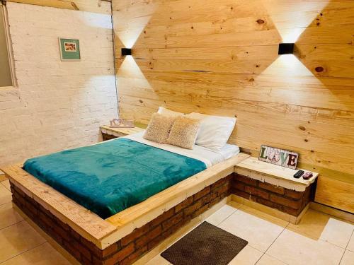 Postel nebo postele na pokoji v ubytování Glamping La Cabanita Santuario