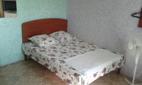 Łóżko lub łóżka w pokoju w obiekcie Гостевой дом на Лисках