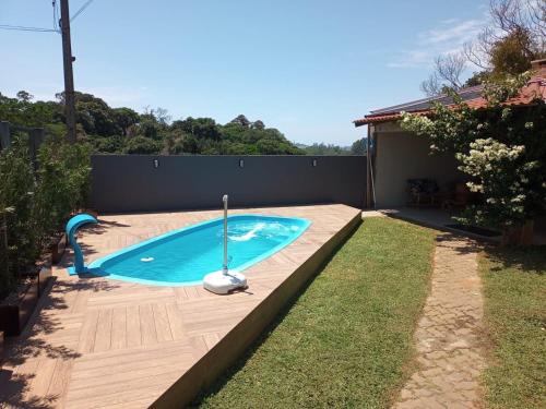 A piscina localizada em Férias em Torres ou nos arredores
