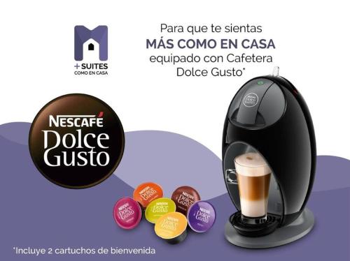 a cup of coffee next to a coffee machine at +MS +Departamento Nuevo +Inmejorable Vista +Amenities Vitea 1004 in Querétaro