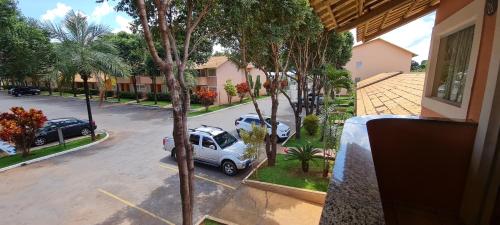 a view of a car parked in a parking lot at diRoma Fiori - Apartamentos JN in Caldas Novas