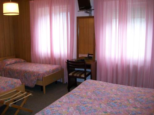 Postel nebo postele na pokoji v ubytování Albergo Bellavista