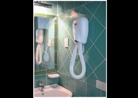 Koupelna v ubytování Hotel Ferraro