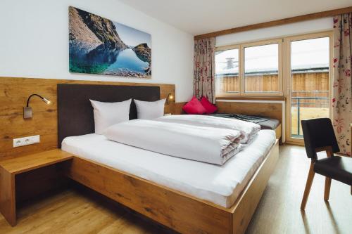 Ένα ή περισσότερα κρεβάτια σε δωμάτιο στο Apart Simala