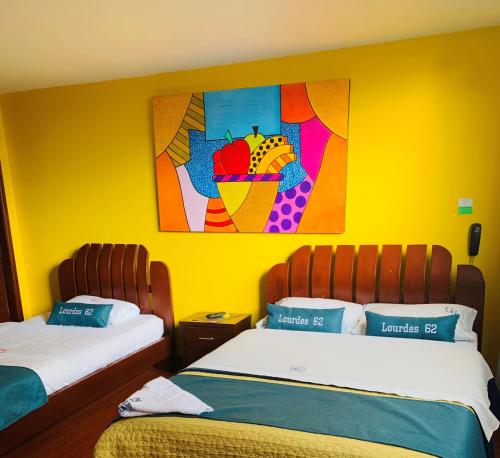 Postel nebo postele na pokoji v ubytování Hotel Lourdes la 62