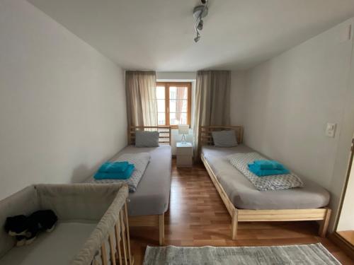 Postel nebo postele na pokoji v ubytování Haus Wiggis