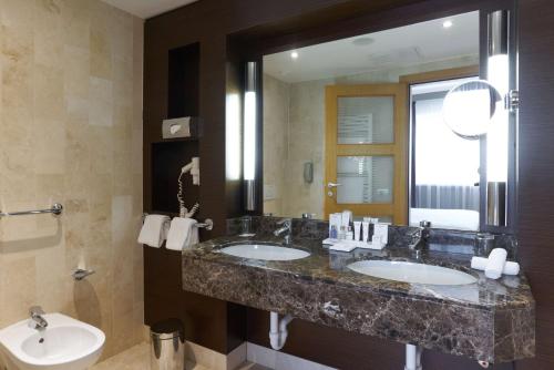 Koupelna v ubytování Radisson Hotel Astana
