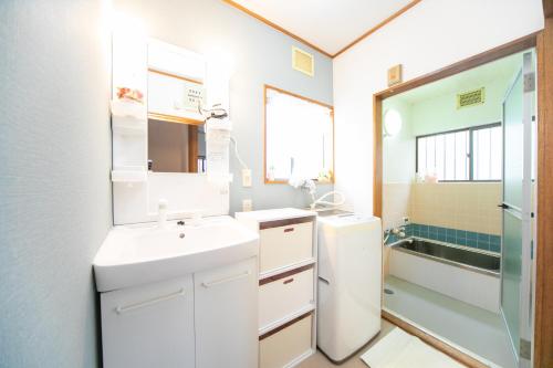 Kylpyhuone majoituspaikassa Yokkaichi Higashihino Hotel
