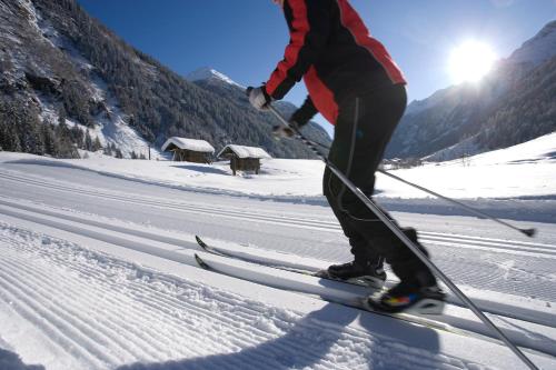 a person is on skis in the snow at Hotel Lärchenhof in Kaunertal