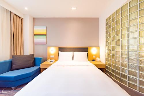 Postel nebo postele na pokoji v ubytování Holiday Inn Express Shijiazhuang Heping by IHG