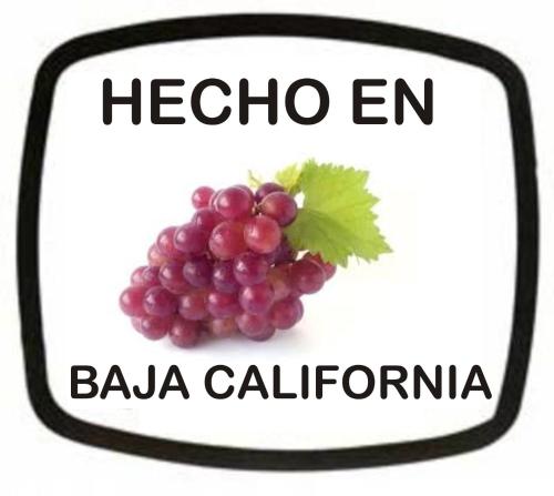 a sign that says hello en with a bunch of grapes at Sn Tony Hotel & Spa in Valle de Guadalupe