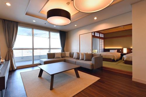 Cama o camas de una habitación en The Gran Resort Elegante Shirahama