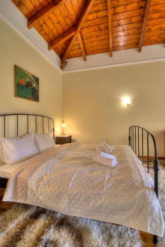เตียงในห้องที่ Villa Escobadd