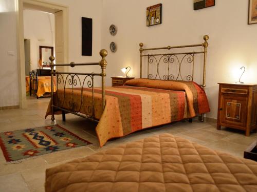 A bed or beds in a room at B&B Le Due Corti