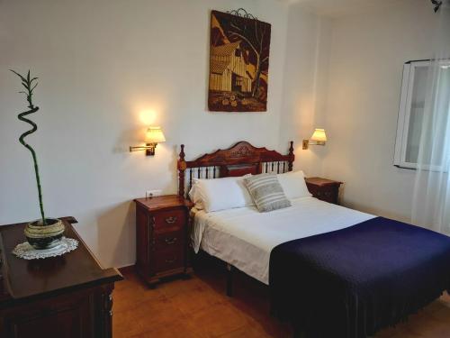 Katil atau katil-katil dalam bilik di Finca Pil - Casa rural con piscina