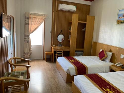 Katil atau katil-katil dalam bilik di King Hotel