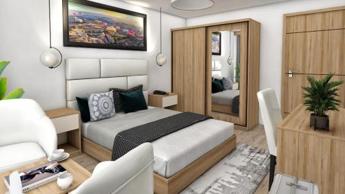 a small bedroom with a bed and a mirror at Kutlucan Oldtown in Bursa