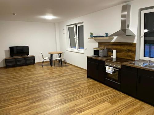 Kuchyň nebo kuchyňský kout v ubytování Zeitunterkunft Soltau